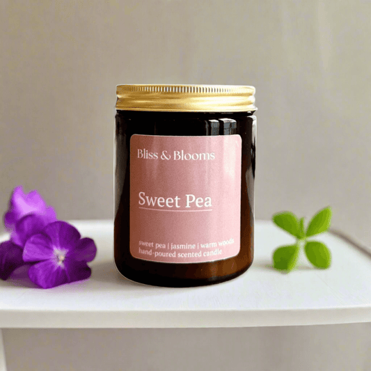 Sweet Pea - Experience the essence of summer with our delightful candle, featuring the light and airy scent of sweat pea, and hyacinth, complemented by rich, creamy warmth creating a sweet floral ambience, perfect for brightening any space. Hand-poured us