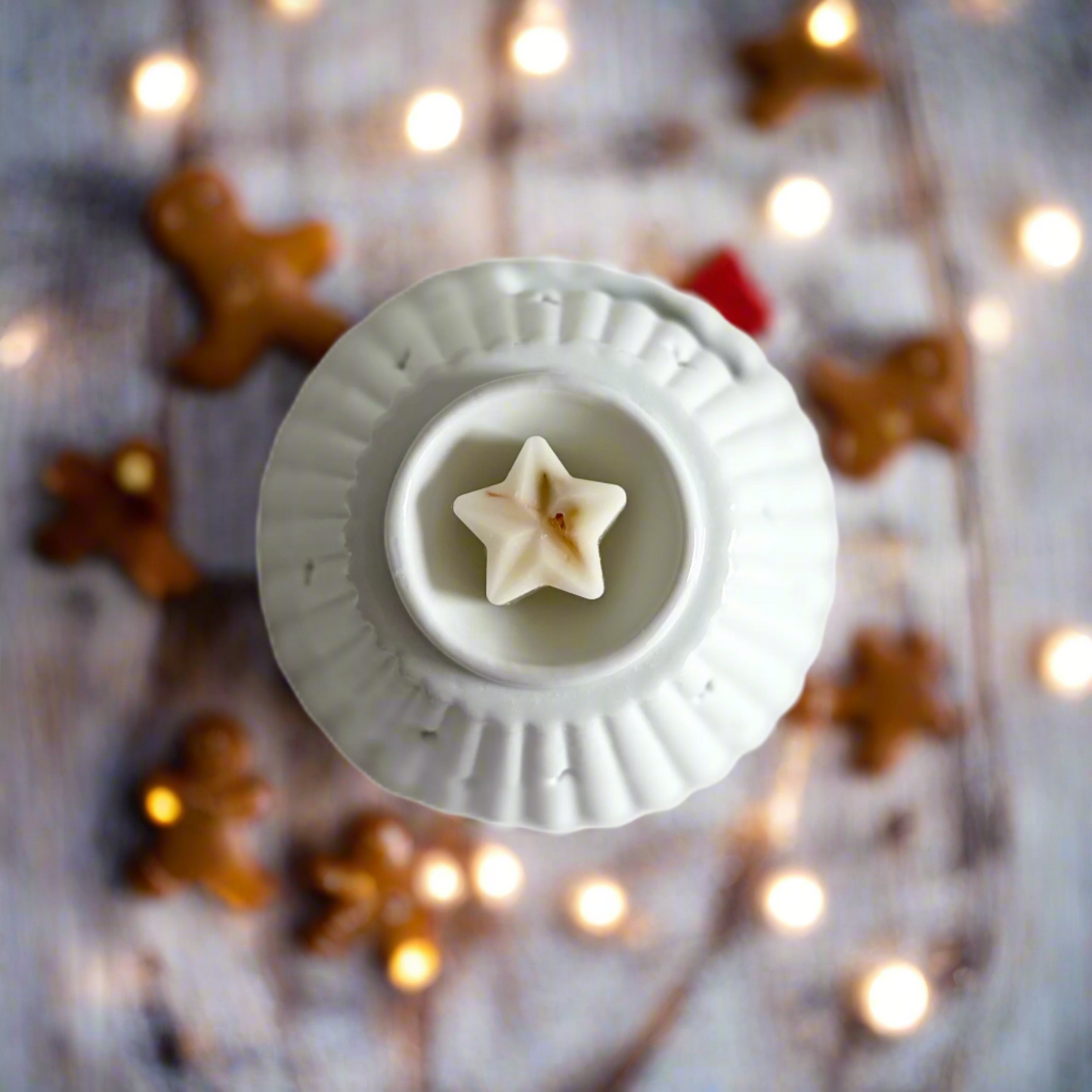 Eight Gingerbread Scented Wax Melts - Fill your home with the irresistible aroma of freshly baked gingerbread with these delightful star shaped wax melts. The warm, spicy notes of gingerbread and cinnamon are complemented by the sweet indulgence of maple 