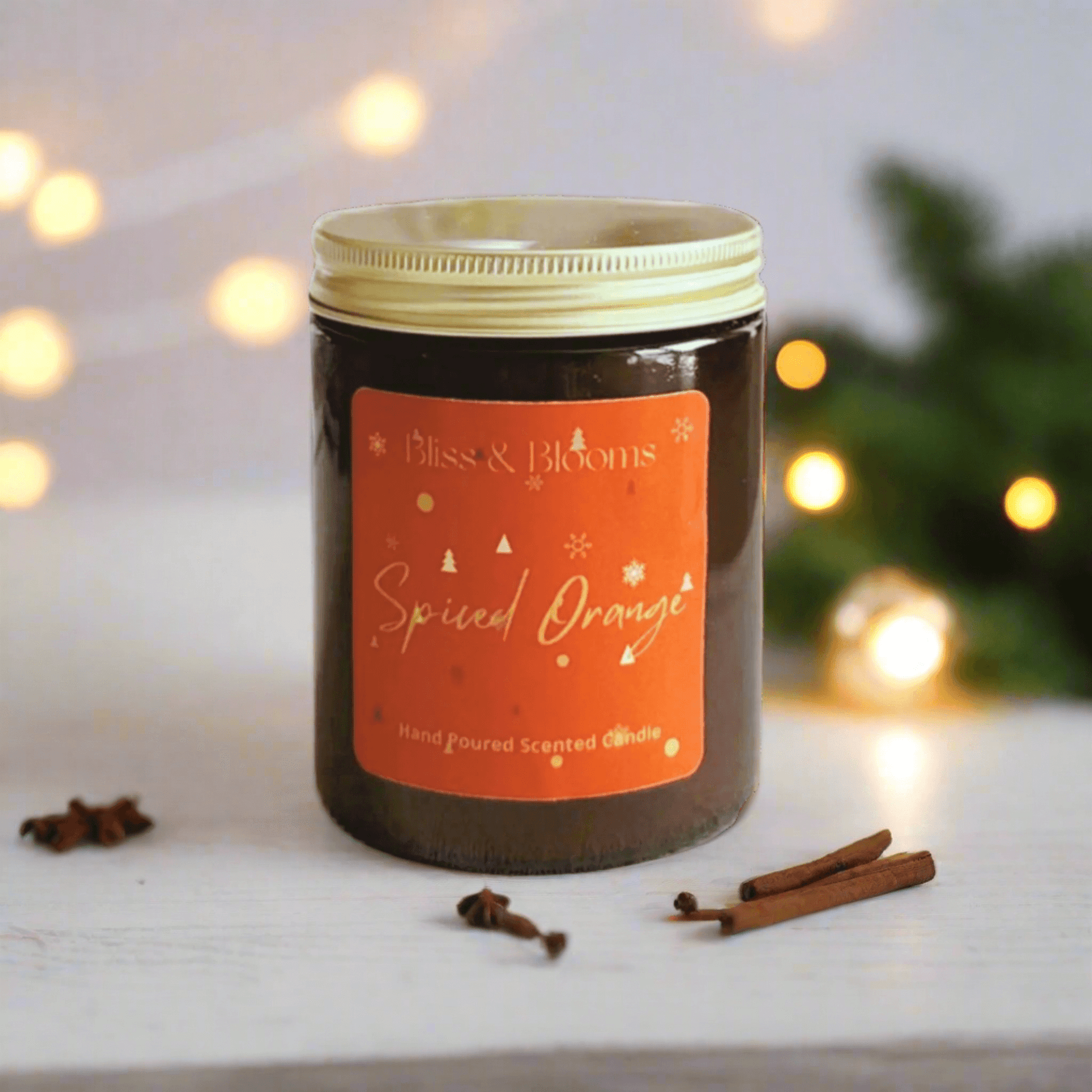 Spiced Orange Scented Candle - Embrace the festive spirit with this ultimate treat with all the magic of Christmas, a captivating blend of spiced orange, vanilla, and warm spices. The zesty sweetness of orange takes centre stage, perfectly balanced by the