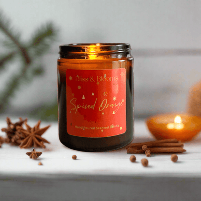 Spiced Orange Scented Candle - Embrace the festive spirit with this ultimate treat with all the magic of Christmas, a captivating blend of spiced orange, vanilla, and warm spices. The zesty sweetness of orange takes centre stage, perfectly balanced by the